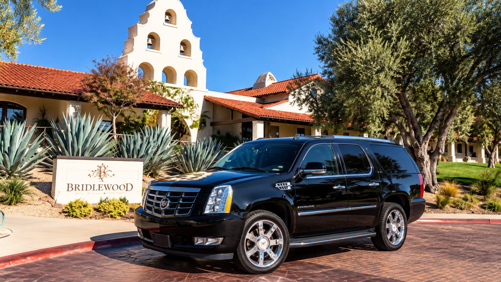 Luxury black car waiting for guests at a Central Coast venue